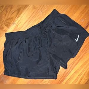 Nike womens Dri-Fit shorts black with drawstring in size large.